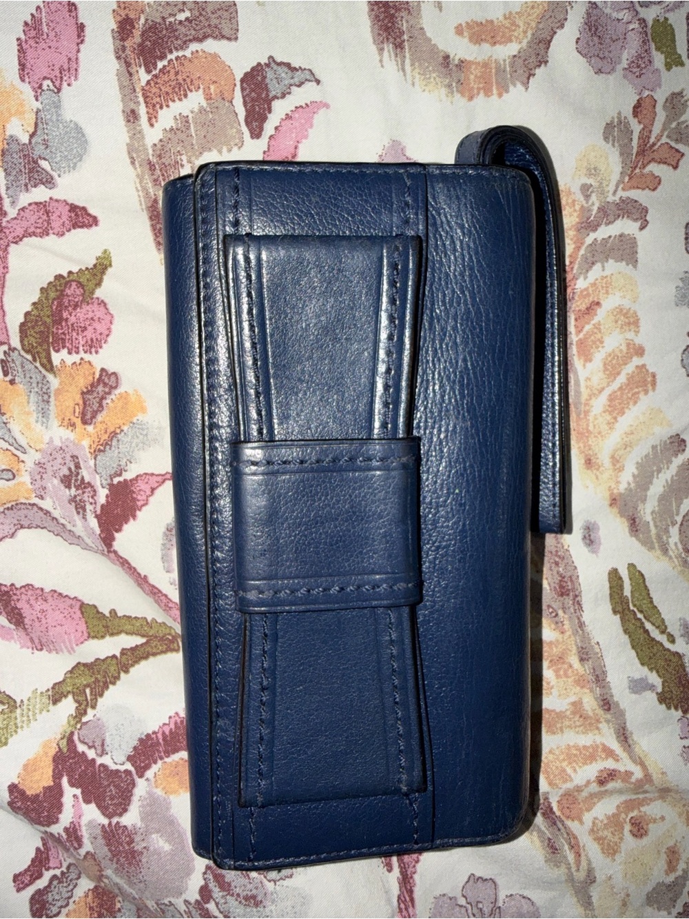kate spade navy blue pebble leather clutch with gold logo plaque